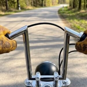 Yellow-motorycycle-vintage-leather-gloves-hold-fast